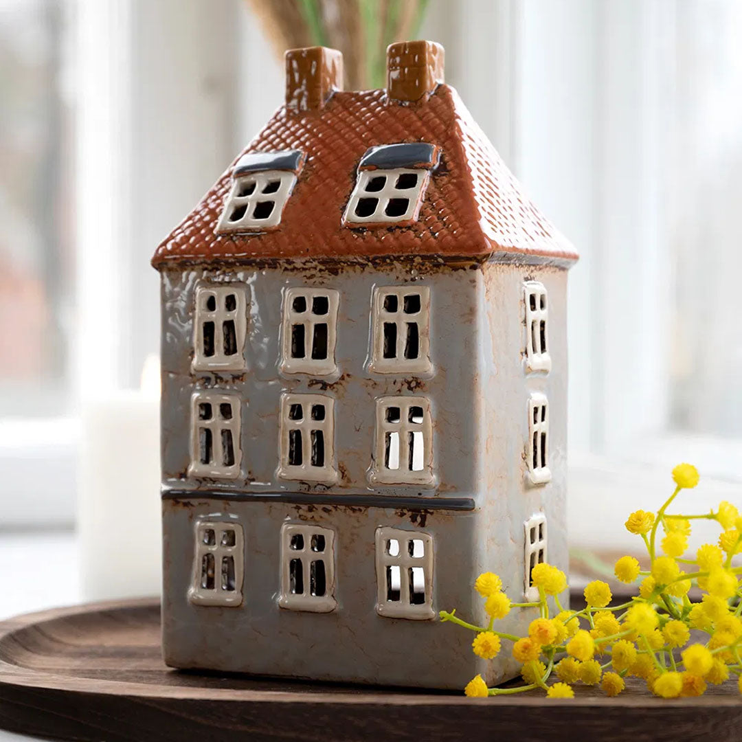 Keramikhaus Beiges Haus mit Teelichtern